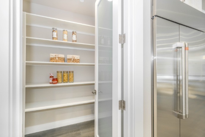 kitchen pantry with a glass door