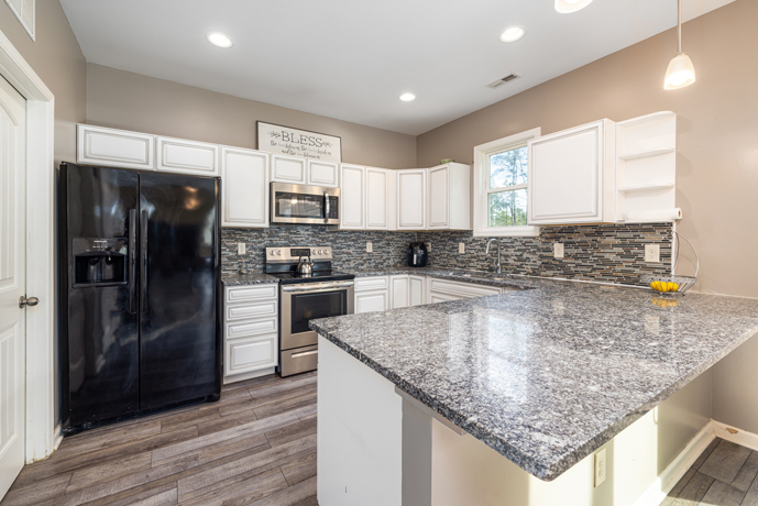 Kitchen built with granite counters.