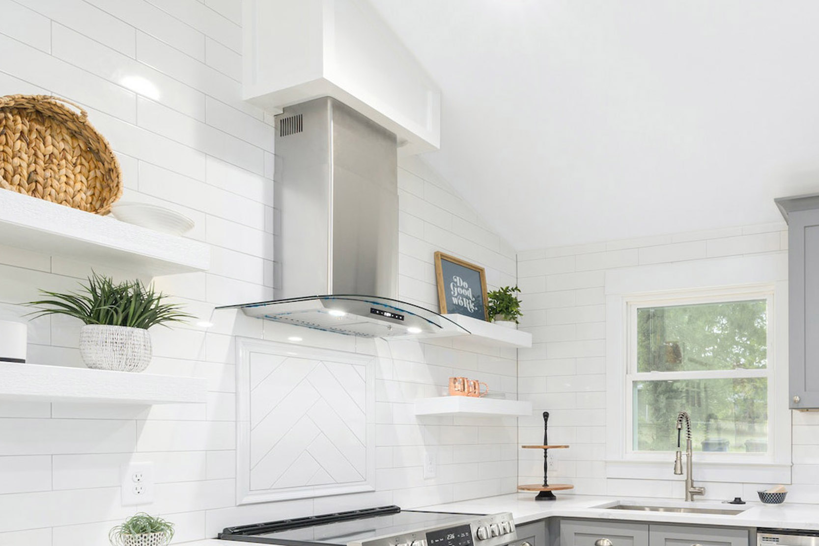 white floating shelves in the kitchen with decorations