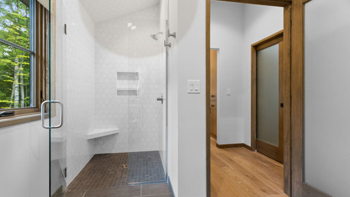 Glass Shower with White Tile