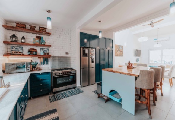 spacious kitchen with a natural wood kitchen island