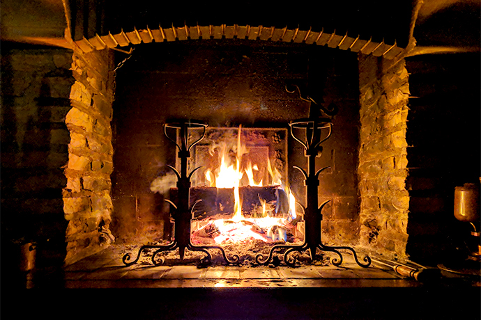 stone made fireplace with fire