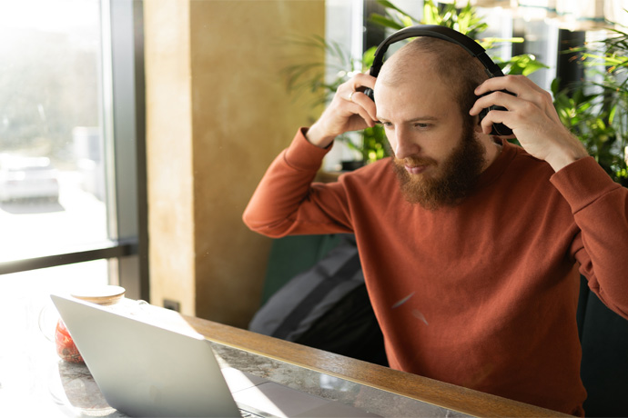 Person using headphone while working