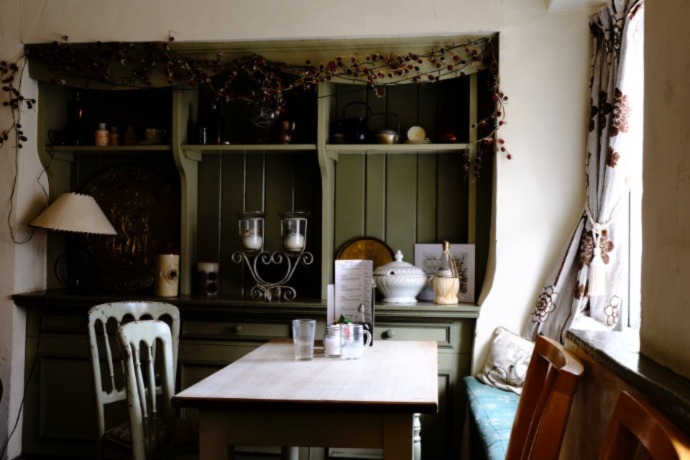 kitchen with some antique elements on the shelves