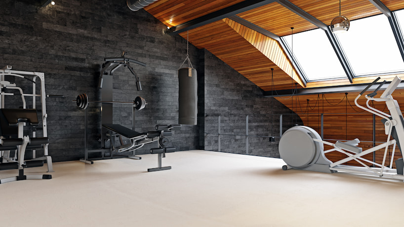 fitness space with gym equipment in the attic 