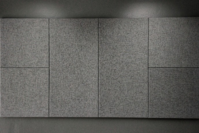 grey acoustic panels on a grey wall