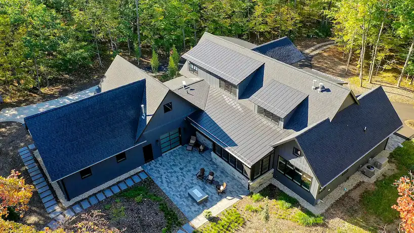 arial view of a newly renovated home in the spring time