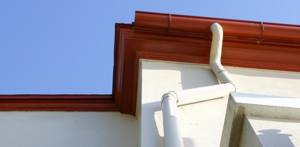 a drain from the roof of the house