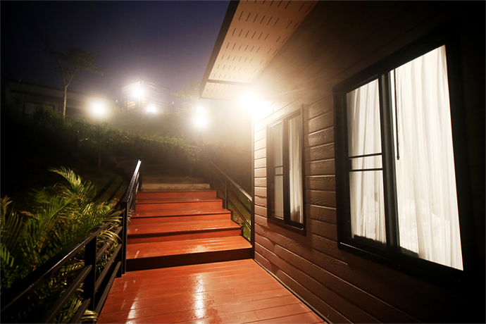 a house with exterior sensor motion light