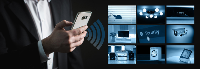 Man holding smartphone controlling smart home app.
