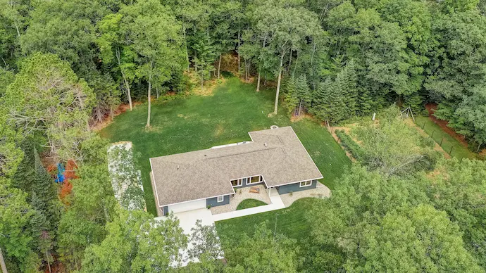 overhead shot of a cabin in the woods