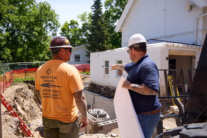 Field crew worker being directed