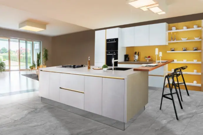 kitchen island with the yellow wall in the back