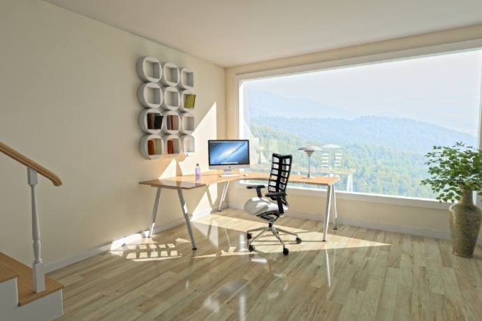 open office space with view of the mountains and green plants