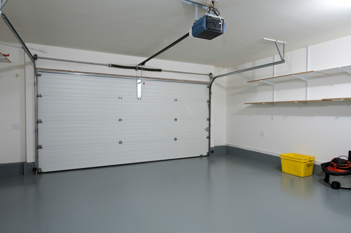 Garage makeover with gray epoxy floor.