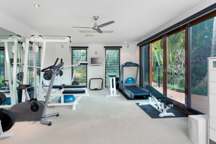 Home gym with equipment for exercising 