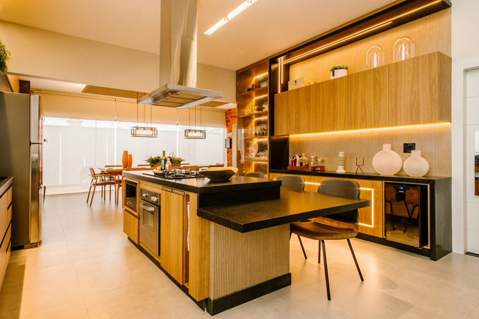 Kitchen with built with entertainment features. 