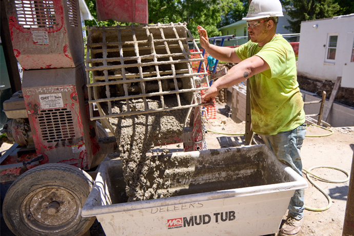 A worker doing concrete work