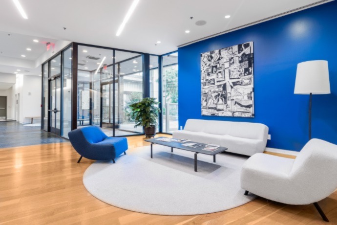 medical office space with a blue wall and a blue chair