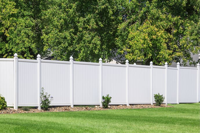 backyard with white picket fence