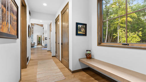 Hallway with Natural Wood Floors