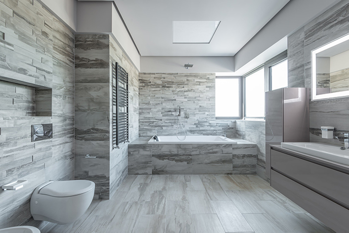 bathroom with stone like tile