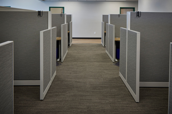 Hallway passing through office cubicles