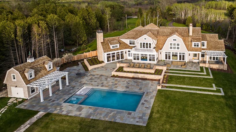 luxury large house with a guest house and a pool. Shot from the drone