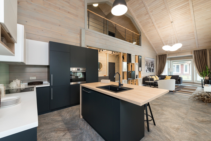 spacious kitchen, ceiling light, dark cupboards, tile flooring and a big window