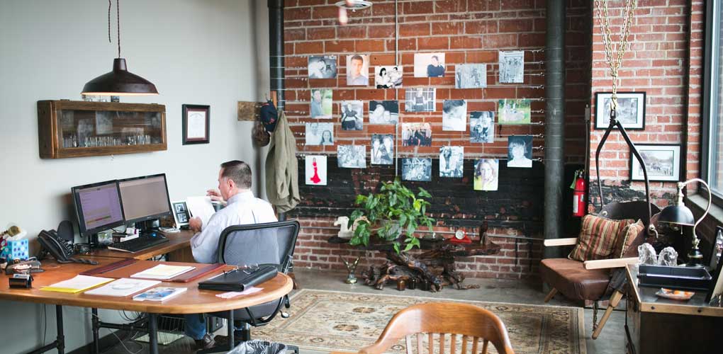 office space with images on the wall making it more personal