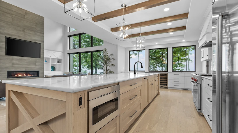 newly remodeled kitchen with white oak flooring and cabinetry