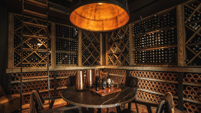 luxury wine cellar with the table in the middle